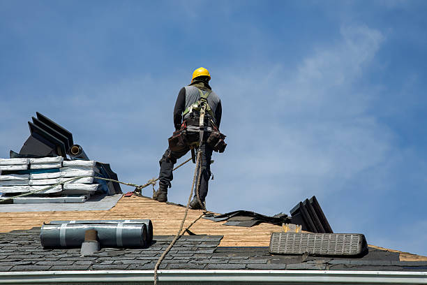 Professional Roof Replacement technician working in Fairview, NY